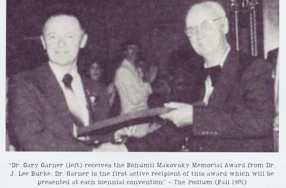 Dr. Gary Garner receiving the Bohumil Makovsky Memorial Award from Dr. J. Lee Burke